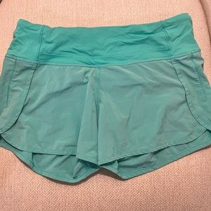 Lululemon 4” Low Rise Teal Speed Up Shorts
